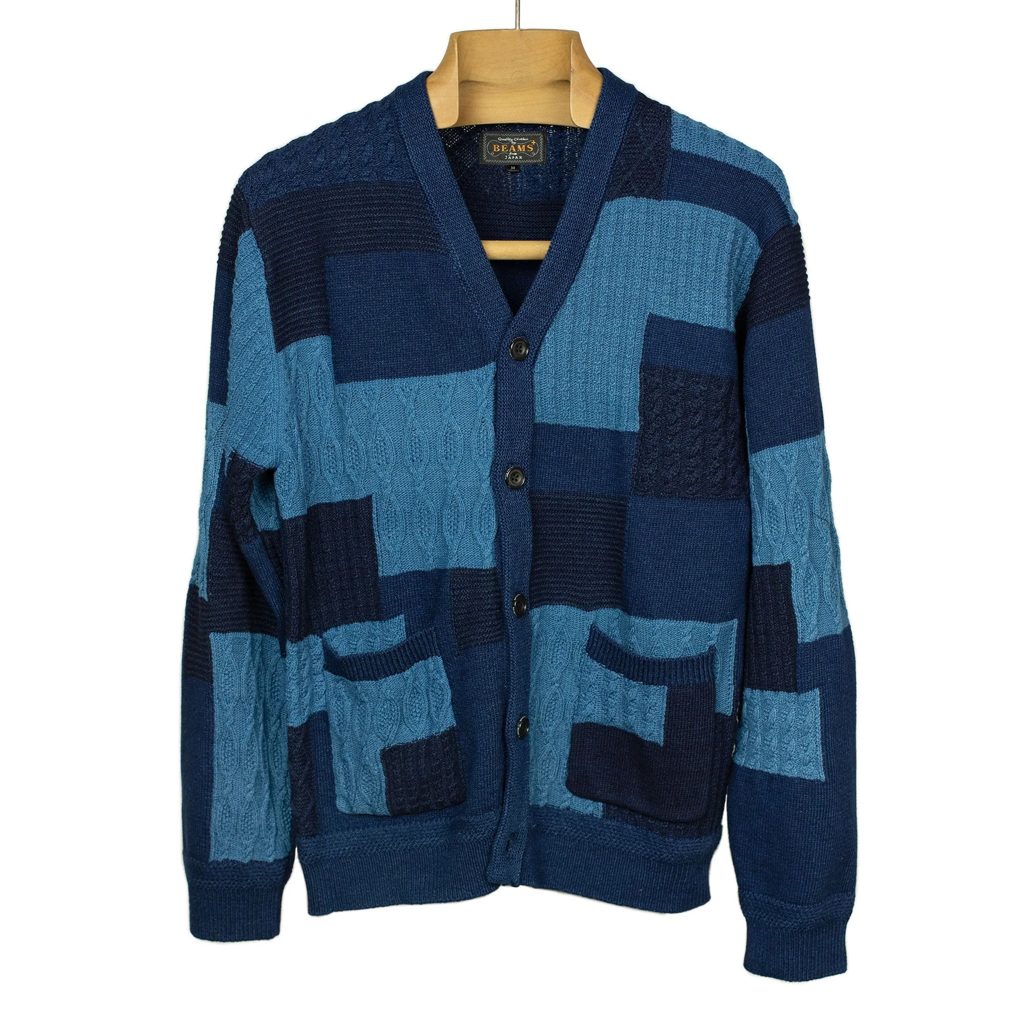 Crazy patchwork cable knit cardigan in indigo-dyed cotton